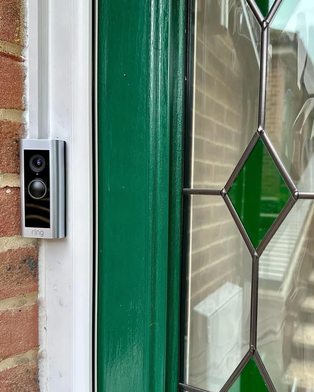 Access control reader, protected entrance, security cameras, and organized control equipment