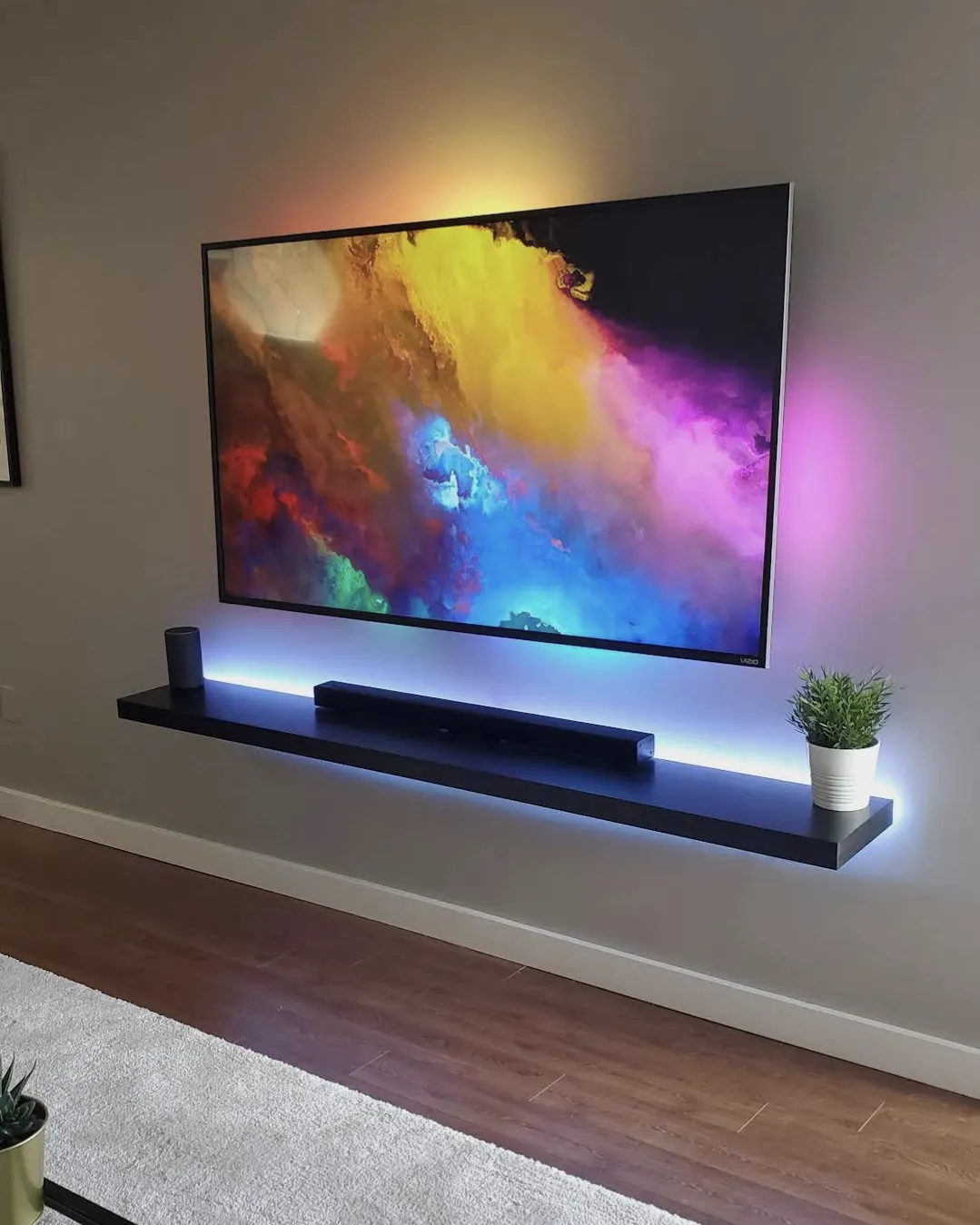 Smart home automation with lighting, shades, thermostat, touchscreen, smart lock, speakers, and organized control equipment