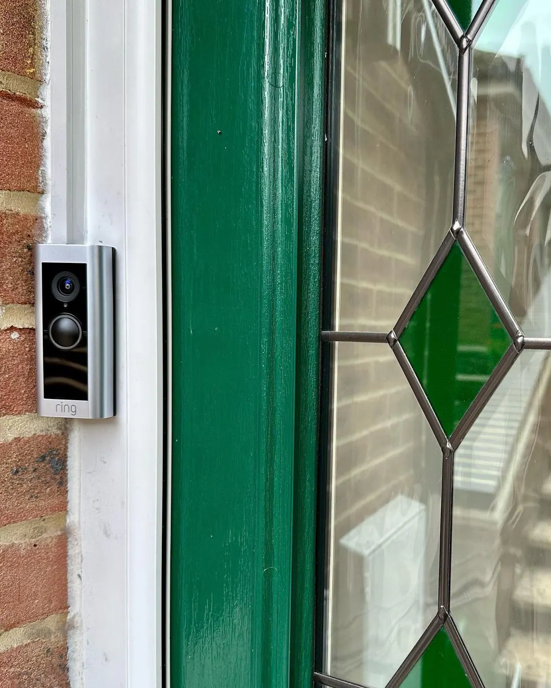 Access control reader, protected entrance, security cameras, and organized control equipment