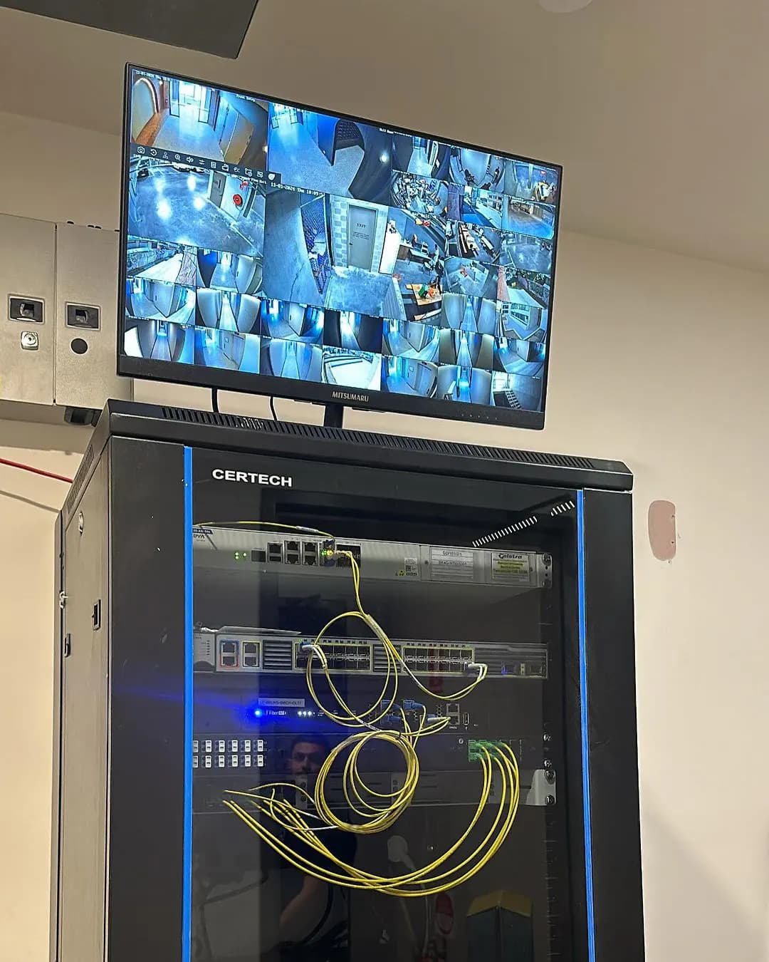 Business network and Wi-Fi infrastructure with managed switches, structured cabling, and organized equipment racks
