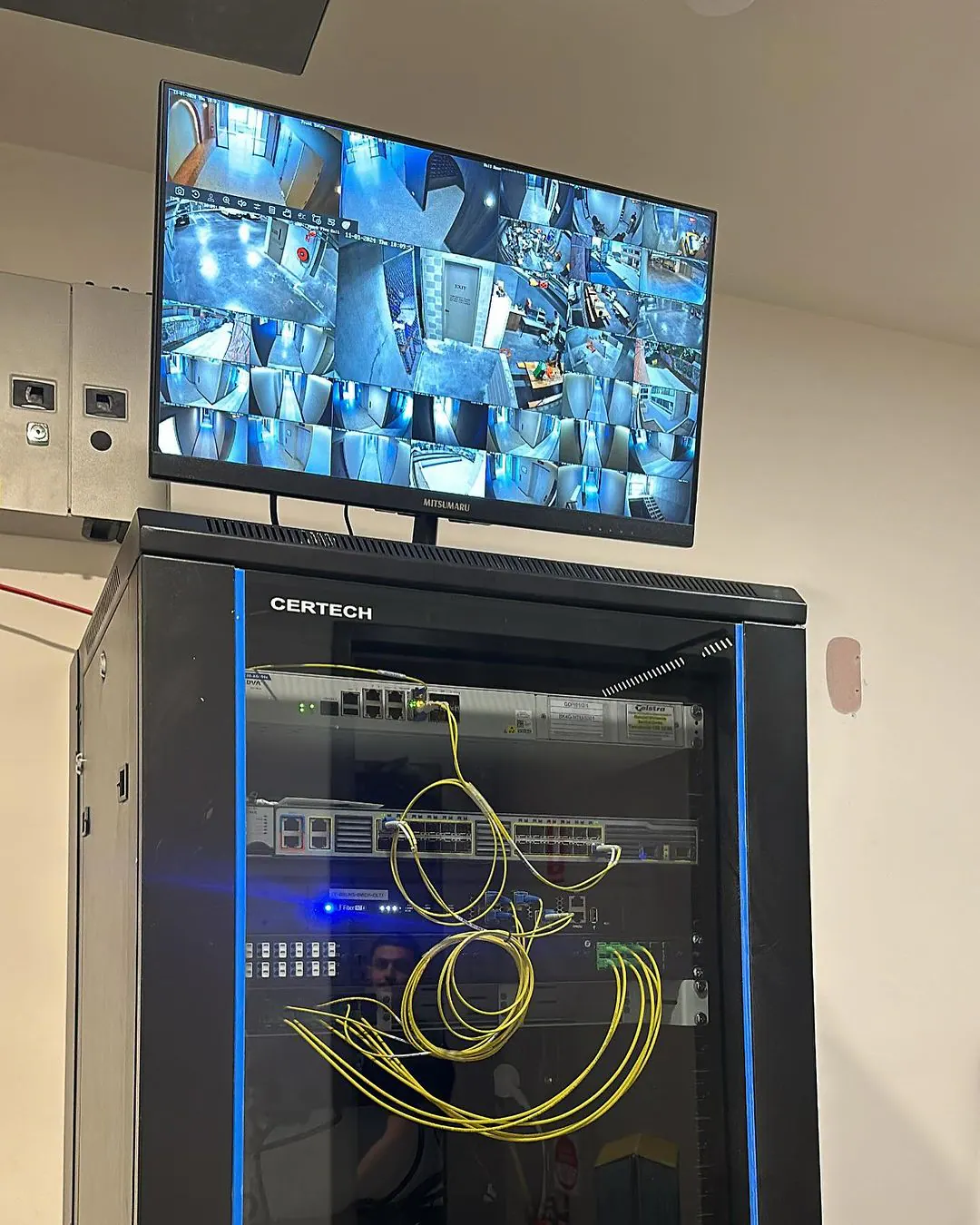 Business network and Wi-Fi infrastructure with managed switches, structured cabling, and organized equipment racks