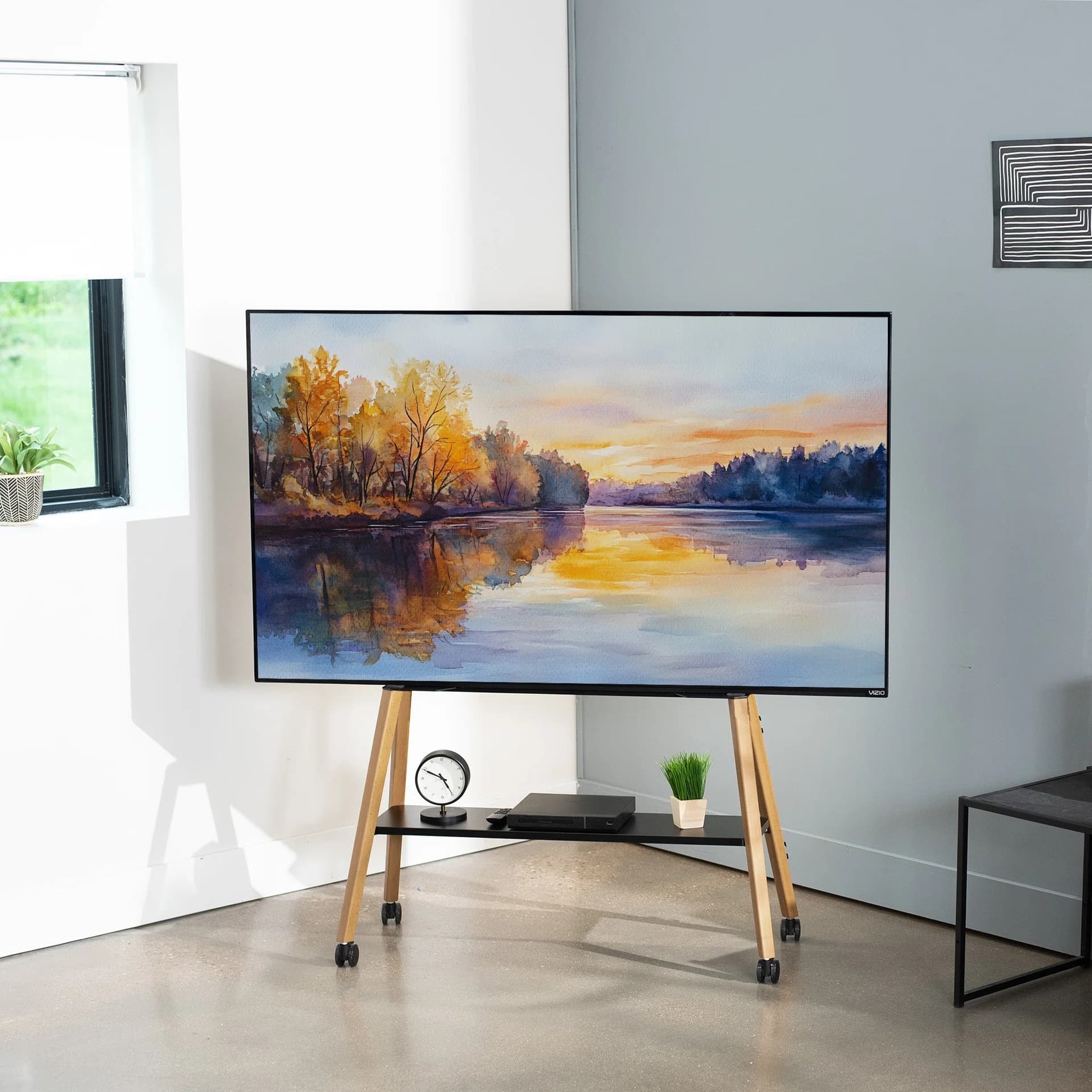 Mobile TV Easel Stand with Shelf - 43” to 75” Screens